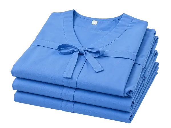 Folded blue medical gown
